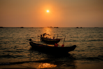 Vietnamese traditional boat at the beach in sunset. Phu Quoc island,. Vietnam