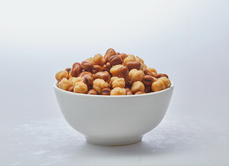 Obraz na płótnie Canvas Chickpeas & fava beans (foul) on white background