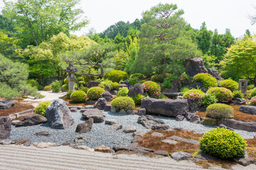 Fototapeta na wymiar Snow garden at Myoman-ji Temple in Kyoto, Japan. The temple was founded in 1389.
