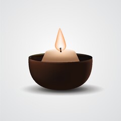 burning candle in holder
