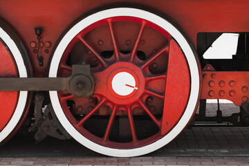 Red white wheel of vintage steam locomotive