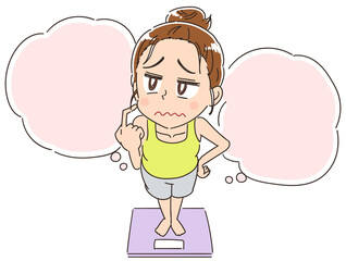 部屋着を着た女性と体重計