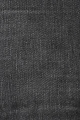 Fototapeta na wymiar Black jeans texture or background with visible fibers 
