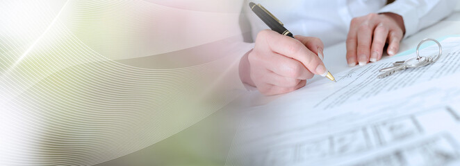 Client signing a real estate contract; panoramic banner