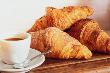 Cup of italian espresso and brioches