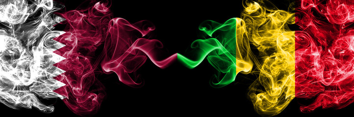 Qatar vs Mali smoky mystic flags placed side by side. Thick colored silky abstract smoke flags.