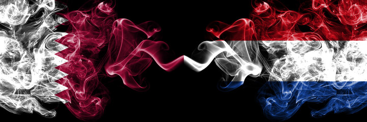 Qatar vs Netherlands, Dutch smoky mystic flags placed side by side. Thick colored silky abstract smoke flags.