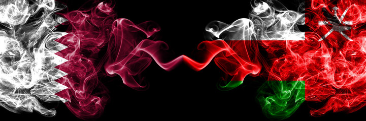 Qatar vs Oman, Omani smoky mystic flags placed side by side. Thick colored silky abstract smoke flags.