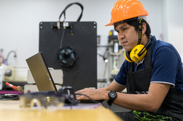 Engineer Working on  Computer 