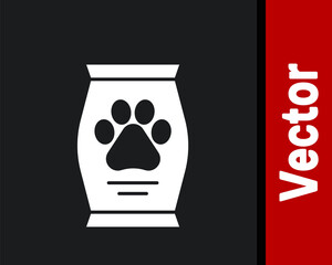 White Bag of food for dog icon isolated on black background. Dog or cat paw print. Food for animals. Pet food package. Vector.