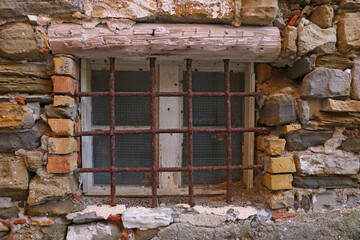 Lattice on the window of an old house.