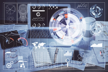 Double exposure of laptop computer and technology theme hologram. Concept of freelance work.