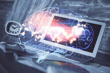Multi exposure of work space with computer and human brain hologram. Brainstorm concept.
