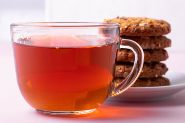 yummy snack concept, consisting of black tea and cookies