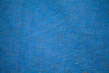 Texture of a blue tarpaulin.