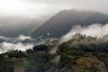 A panoramic view of mist and fog engulfed Ranka village look mesmerizing as seen from Gangtok in East Sikkim. Monsoon gives a tremendous different variety of pictorial views to capture.