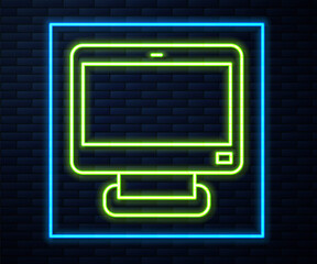 Glowing neon line Computer monitor screen icon isolated on brick wall background. Electronic device. Front view. Vector.