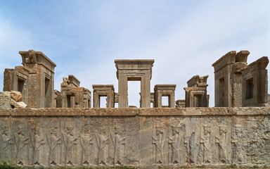 Fototapeta premium Ancient temple ruins at Persepolis, Iran, with stone columns