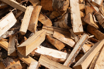 A pile of chopped birch firewood. Harvesting for the winter.