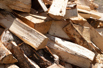 A pile of chopped birch firewood. Harvesting for the winter.