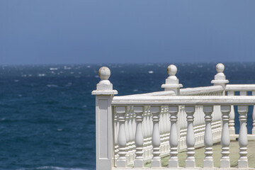 balcony with sea views, white balustrade