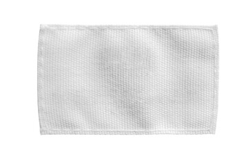Fototapeta na wymiar White blank laundry care clothes label isolated on white background