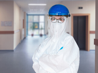 Female doctor wearing  protective suit to fight coronavirus pandemic