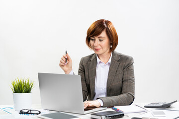 Attractive middle aged businesswoman working