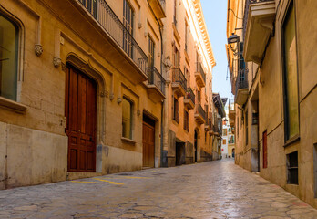 colorful narrow street in Palma de Mallorca old town, Mallorca island, Balearic Islands, Spain