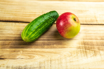 Cucumbers on a wooden surface