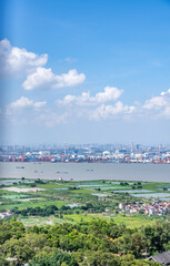 Fototapeta premium Lianhua Mountain, Panyu, Guangzhou, China overlooks Dongguan Xinsha Port