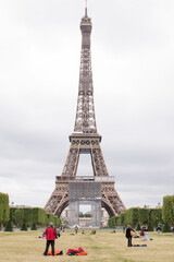 Fototapeta na wymiar Paris, France, June 06, 2020: the Eiffel Tower in Paris and tourists