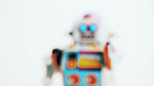 Walking wind-up tin toy Robot