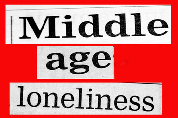 Fototapeta premium Distressed newspaper headline about middle age loneliness