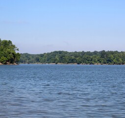 A beautiful view of the calm water of the lake.