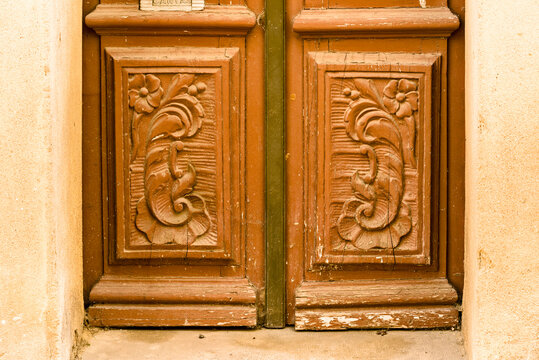 Carved Old Wooden Door In Olhao, Portugal