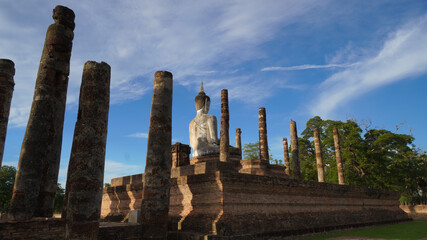 Sukhothai Wat Mahathat Buddha statues at Wat Mahathat ancient capital of Sukhothai, Thailand. Sukhothai Historical Park is the UNESCO world heritage.

