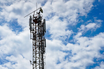 scaffolding with antennas on a blue background