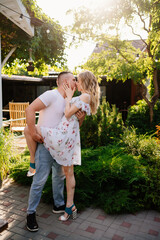 beautiful and happy couple having fun in garden.