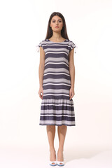 business woman executive posing in formal striped long skirt summer dress