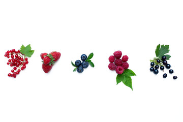 Composition of fresh berries with leaves on white.