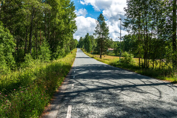 Fototapeta na wymiar Sweden/Main road through the small Swedish village of Nordmark on a beautiful sunny day