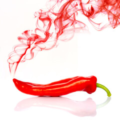 Red hot chili pepper isolated on white background with red smoke