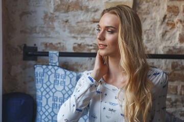 Young pretty woman resting on sofa