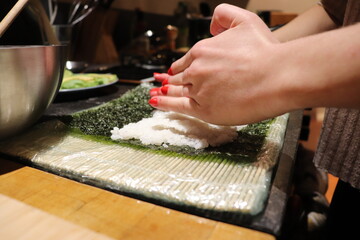 chef preparing sushi