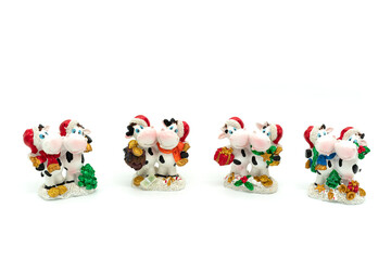 Ceramic toy cow isolated on a white background