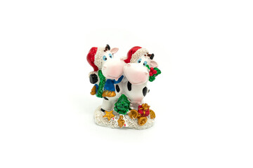 Ceramic toy cow isolated on a white background