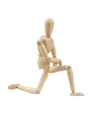 Wooden mannequin standing on one knee isolated on white background, black lives matter concept