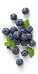 Blueberry fruit top view isolated on a white background, flat lay overhead layout with mint leaf,...