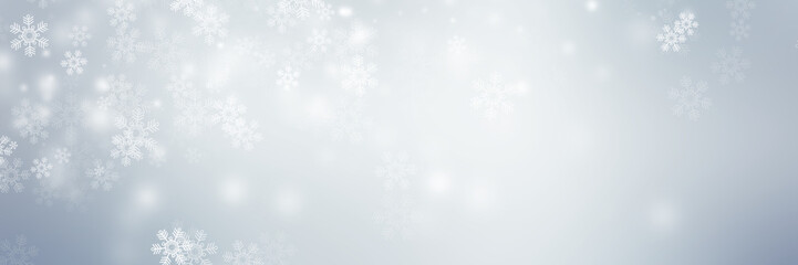 wide white and gray Christmas light with snowflake bokeh background, Winter backdrop wallpaper.